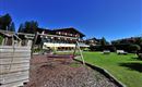 Söll_Alpenpanorama_Wilder Kaiser_Gartenanlage
