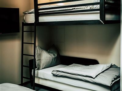 Söll_AparthotelOldSchool_Schlafzimmer_WilderKaiser
