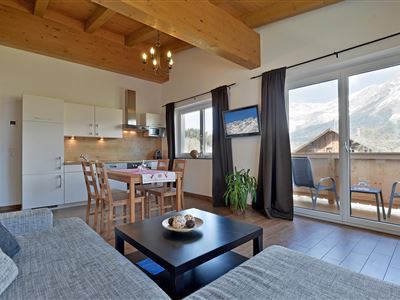 Wohnraum mit Balkon Wilder Kaiser