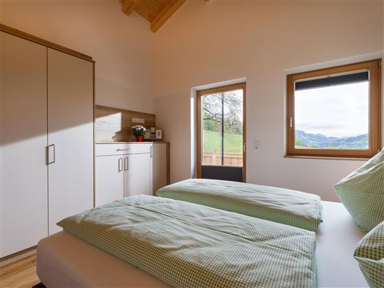Ferienwohnung_Obersteintal_Reit_13_Soell_Schlafzim