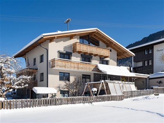 Haus_Bergschmied_Pfarrgasse_10_Westendorf_Haus_Win