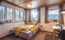 Wohnzimmer-Zusatzbett
