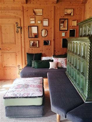 Lounge room with built-in table and chairs, couch and T.V
